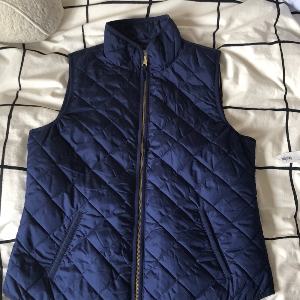 Navy blue quilted vest